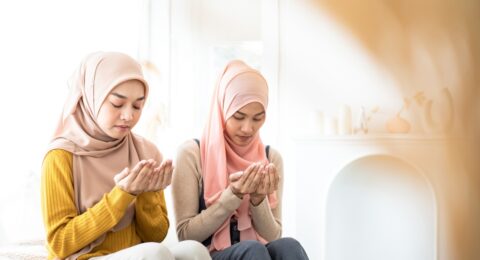 Young,Asian,Women,Wear,Pink,And,Yellow,Hijab,Having,Worship